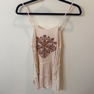 White dress with aztec design